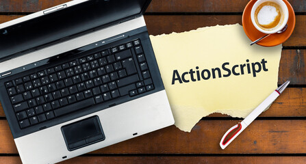 ActionScript  Programming Language. Word ActionScript on paper and laptop 