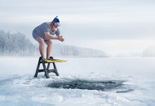 Fuunny Overweight, Retro Swimmer About To Jump Into Ice Hole In The Lake, With Copy Space