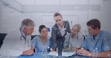 Canvas Print - Composition of person icon, statistics and network of connections over doctors in meeting