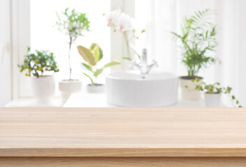 Wall Mural - Blank tabletop for product display with blurred bathroom sink background