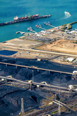 Wall Mural - Pilot boats and RG Tanna coal wharfs and piles in Gladstone, Queensland