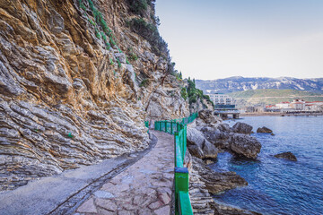 Canvas Print - View on the Tourist path to Mogren beach in Budva town on Adriatic shore, Montenegro