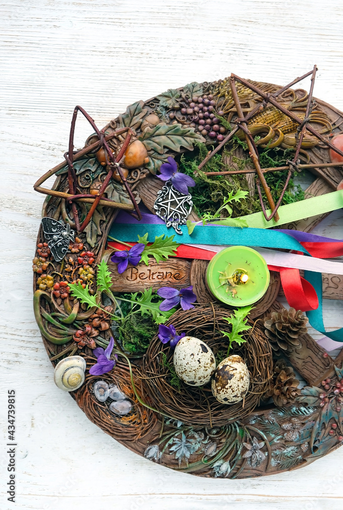 Wiccan altar for Beltane sabbath. spring pagan festive ritual. wheel of ...