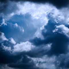Wall Mural - Sky with fluffy clouds. Close-up. Thunderclouds background with copy space for design. 