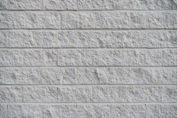 Gray and rough concrete brick wall. Concrete block wall background and texture.