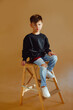 portrait of a fashionable little boy in the studio