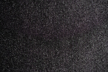 Wall Mural - Shiny sparkling glitter texture black background