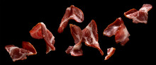Falling Sliced Bacon Isolated On Black Background