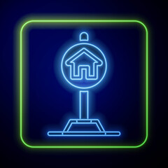 Wall Mural - Glowing neon Hotel sign for traffic icon isolated on blue background. Vector