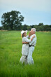 © aletia2011 - Happy senior couple dancing in summer park