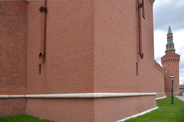 House corner, Brick wall painted with red paint.