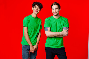 two friends in green t-shirts communication friendship positive