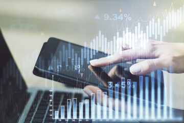 Double exposure of abstract creative financial chart with finger clicks on a digital tablet on background, research and strategy concept