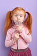 © alfa27 - smiling little girl child holding magic wand in hand, want to be enchantress, adorable cute kid girl with natural red hair dreams, game of fairy, sorceress. Performance of play. Costume party
