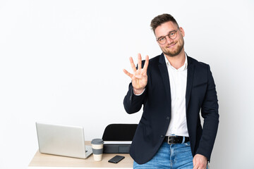 Sticker - Russian man in a office isolated on white background happy and counting four with fingers