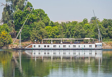 Large Egyptian River Cruise Dahabeya Boat Moored On Nile Bank