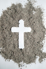 Wall Mural - Cross made of ashes. Ash Wednesday. Lent season. France.