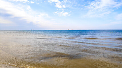 Beautiful view on seaside ocean skyline at sunny summer day with blue sky, tropical vacation. Panoramic scenic nature landscape horizon