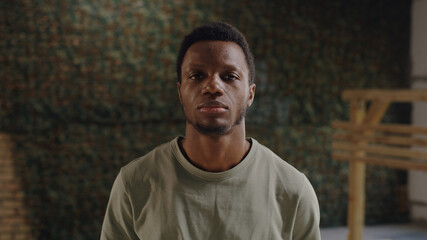 Wall Mural - Black soldier in gym of military base