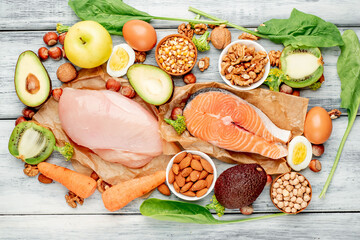 Wall Mural - Natural, protein-rich food on a wooden background. Healthy food concept
