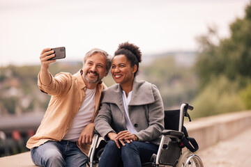 Two lovers, smiling face, enjoying outside.