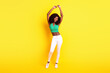 Full length body size photo girl dancing overjoyed relaxing on weekend isolated vibrant yellow color background
