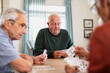 © Rido - Senior people playing cards