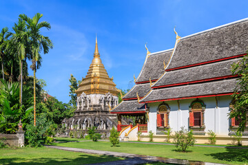 Wall Mural - Ancient chapel and golden pagoda at Wat Chiang Man in Chiang Mai, North of Thailand