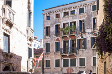 facades of the narrow streets of the old city of Venice