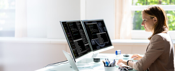 Programmer Woman Coding On Computer