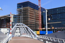 Amsterdam Oosterdok White Bridge With Construction Site In The Background