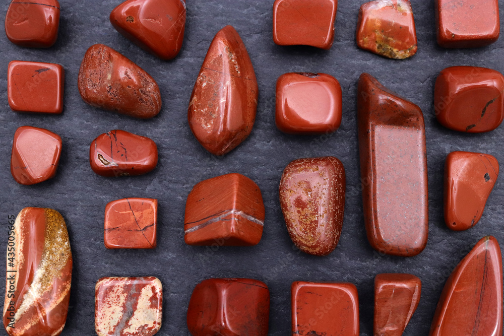 Red jasper rare jewel stones texture on black stone background Stock ...