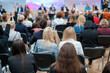 © Anton Gvozdikov - Anonymous people listening to presentation during conference