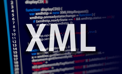 Wall Mural - extensible markup language. xml code on dark background in code editor and word xml