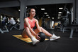 © mad_production - Attractive sportswoman doing sit ups with medicine ball