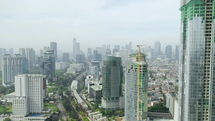 Wall Mural - Beautiful aerial landscape of misty Jakarta city