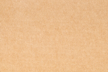 Wall Mural - Paper cardboard background. Natural carton sheet. Kraft cardboard texture. Brown paperboard, top view.