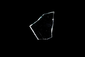Wall Mural - glass fragments in isolation on a black background. damaged window. damaged object