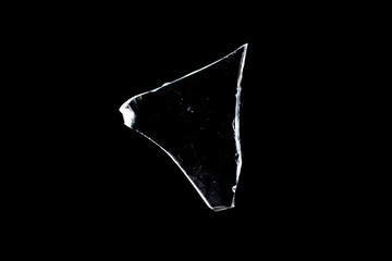 Wall Mural - glass fragments in isolation on a black background. damaged window. damaged object