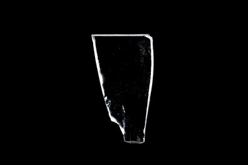 Wall Mural - glass fragments in isolation on a black background. damaged window. damaged object