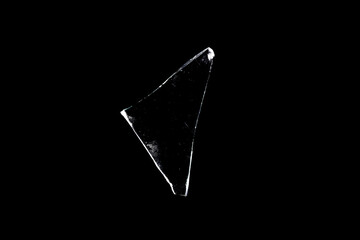Wall Mural - glass fragments in isolation on a black background. damaged window. damaged object