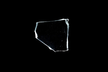Wall Mural - glass fragments in isolation on a black background. damaged window. damaged object