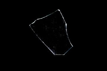 Wall Mural - glass fragments in isolation on a black background. damaged window. damaged object
