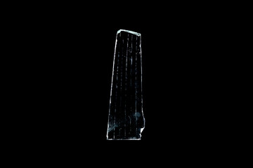 Wall Mural - glass fragments in isolation on a black background. damaged window. damaged object