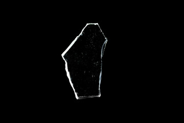 Wall Mural - glass fragments in isolation on a black background. damaged window. damaged object