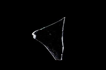 Wall Mural - glass fragments in isolation on a black background. damaged window. damaged object
