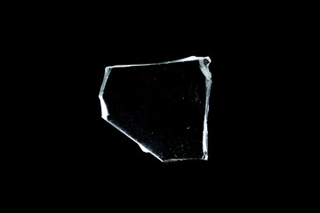 Wall Mural - glass fragments in isolation on a black background. damaged window. damaged object