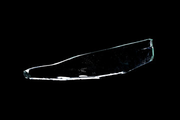 Wall Mural - glass fragments in isolation on a black background. damaged window. damaged object