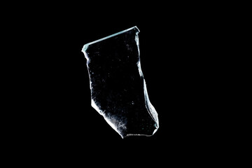 Wall Mural - glass fragments in isolation on a black background. damaged window. damaged object