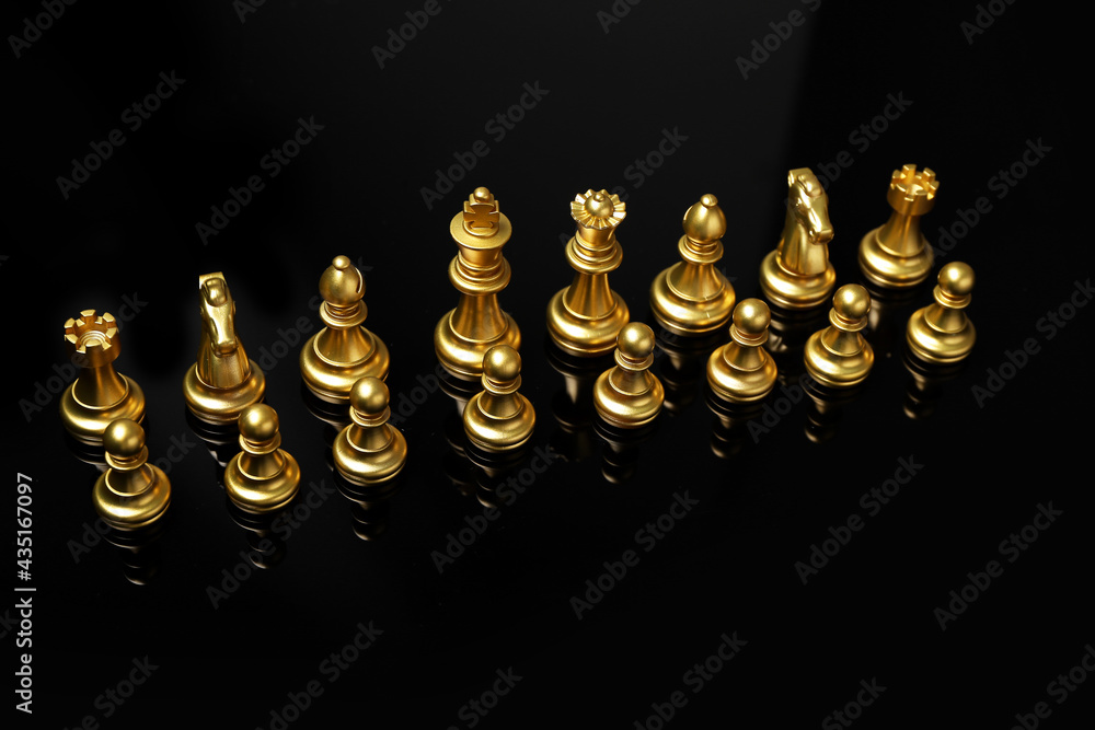 Chess pieces on dark background
